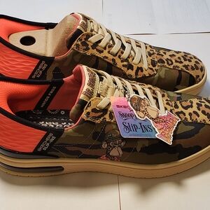 Skechers Camo Leopard Slip-Ons with Orange Accents